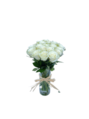 White roses in glass vase
