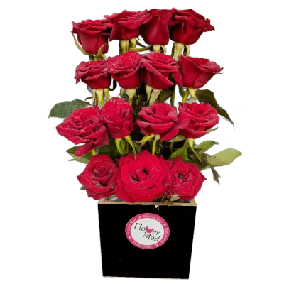 Roses in black wooden box