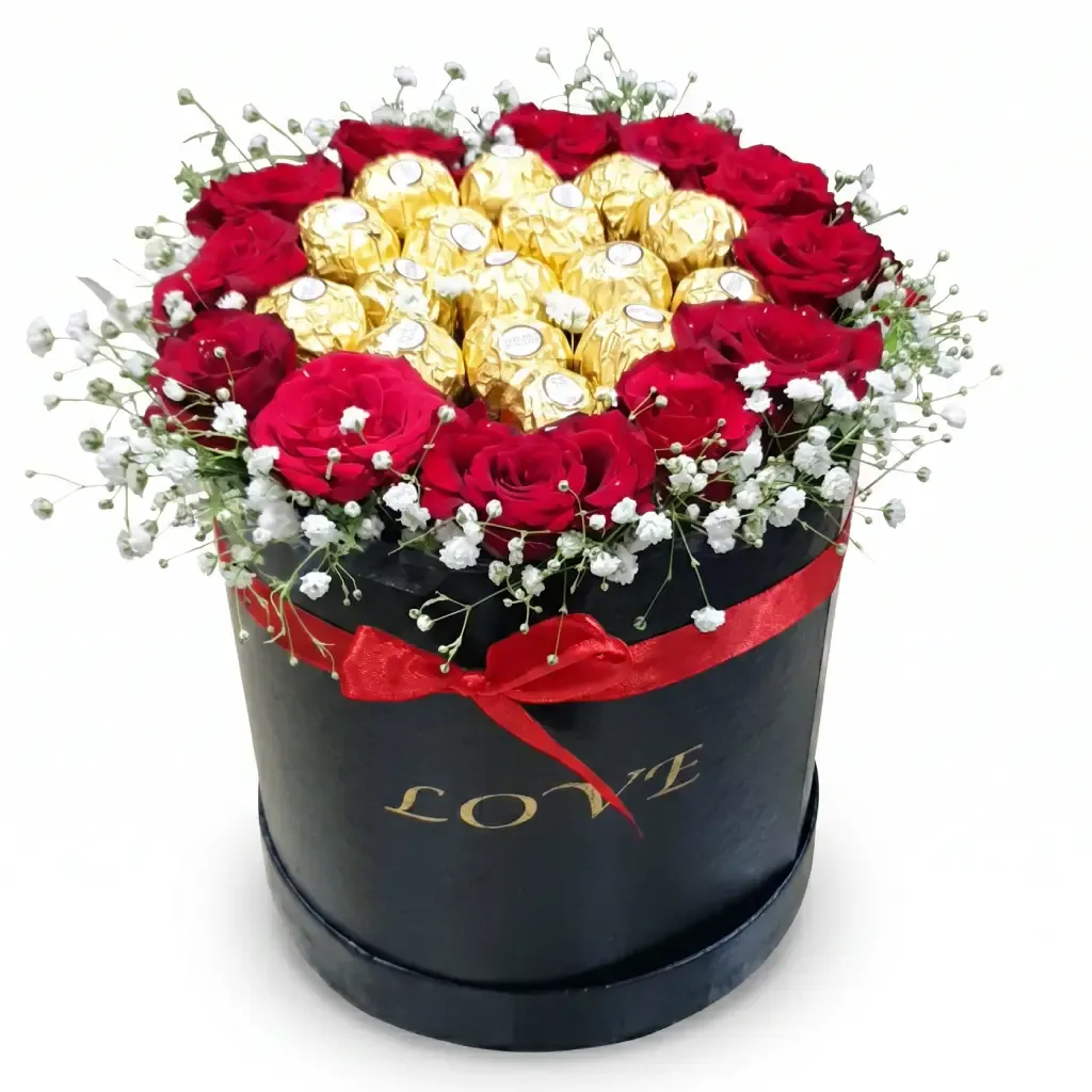 red roses and ferrero rocher in black box