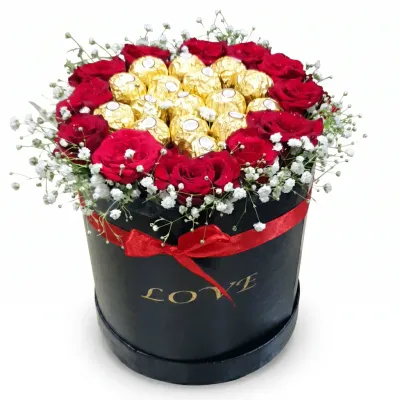 red roses and ferrero rocher in black box