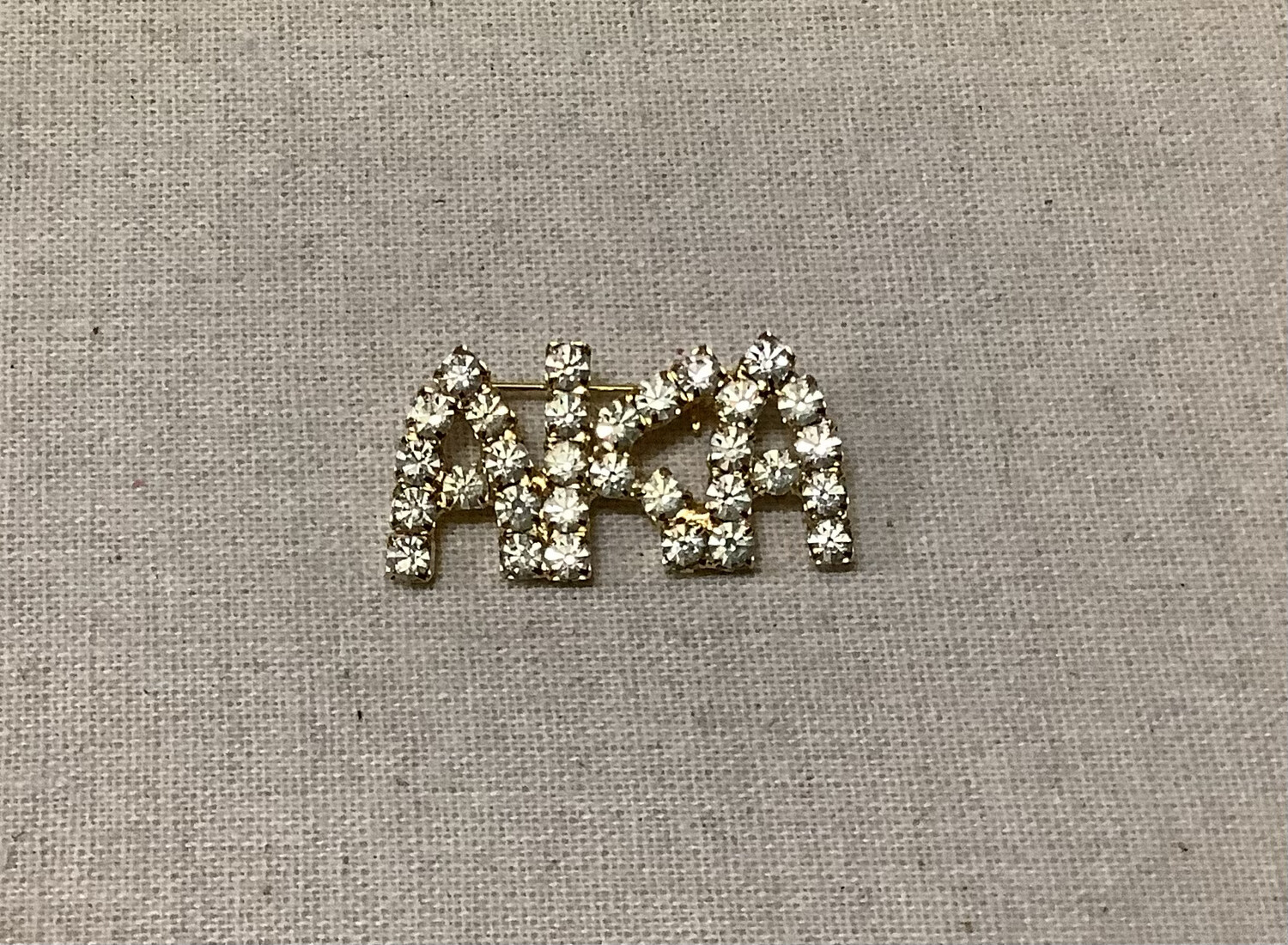 Vintage Rhinestone AKA Pin