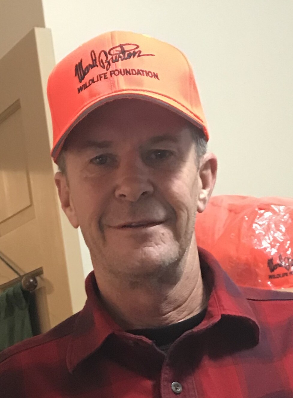 Orange cap with logo in black Orange cap with logo in black
