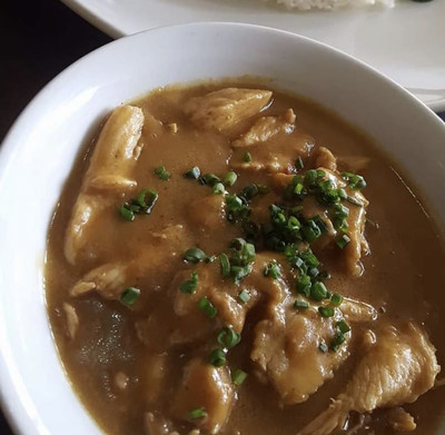 Chicken smothered in peanut sauce