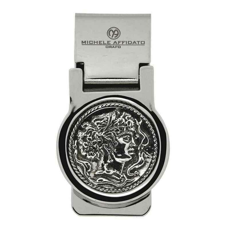 Fermasoldi in metallo con moneta in argento magno greca.