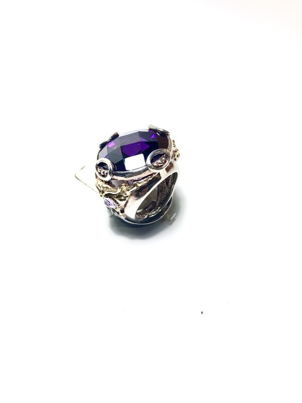 Anello arg.925 e oror con pietra sfaccetta viola Anello arg.925 e oror con pietra sfaccetta viola