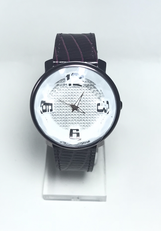 Orologio donna con cristallo a prisma tondo e cinturino in pelle bordeaux Orologio donna con cristallo a prisma tondo e cinturino in pelle bordeaux