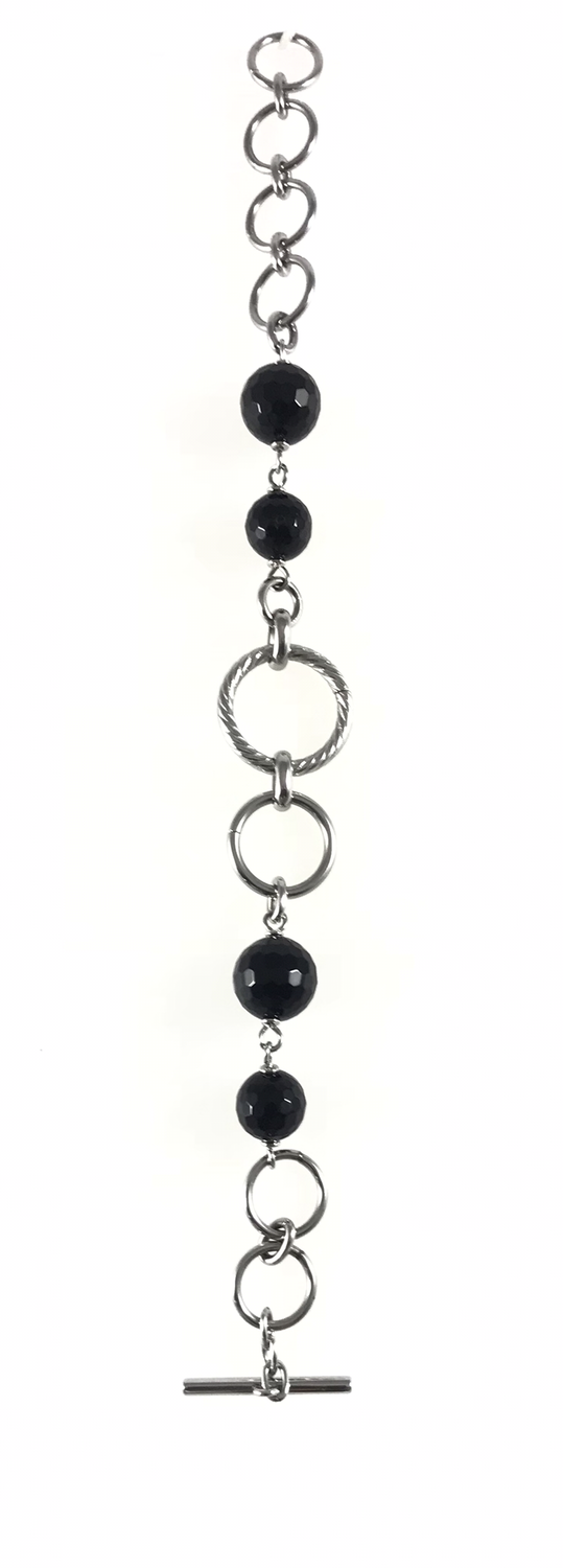 BRACCIALE ACCIAIO E SFERE IN AGATA NERA SFACCETTATE