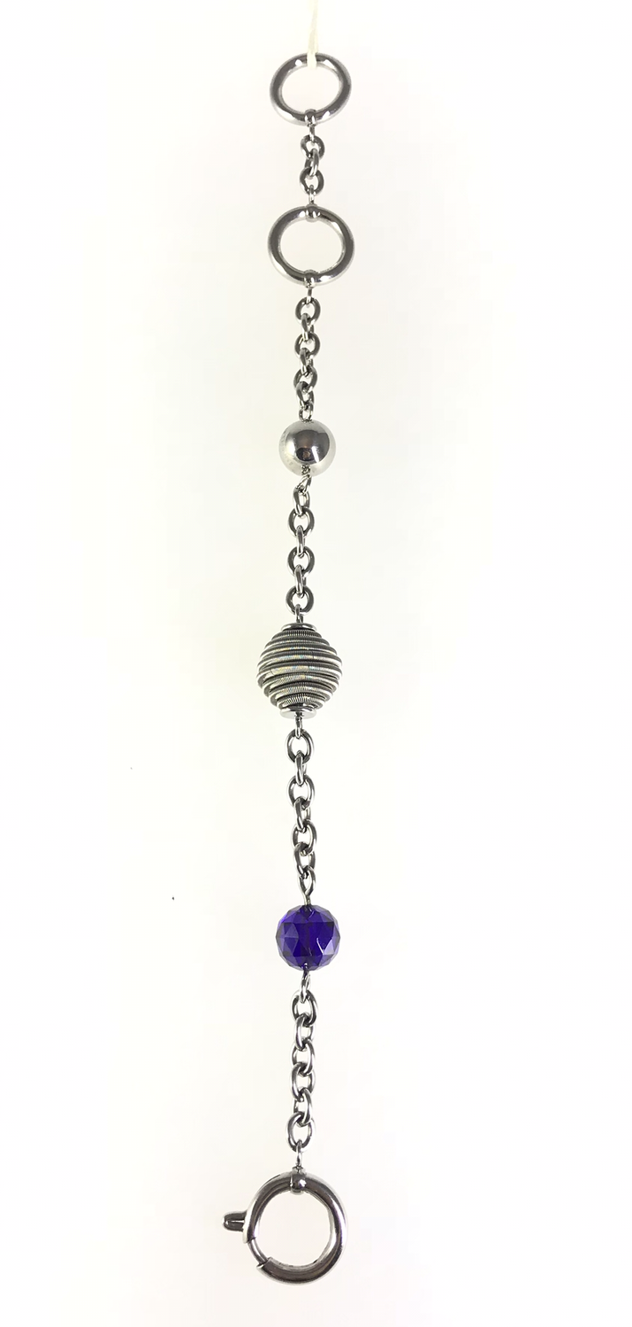 BRACCIALE CON SFERE E PIETRA SFACCETTA VIOLA