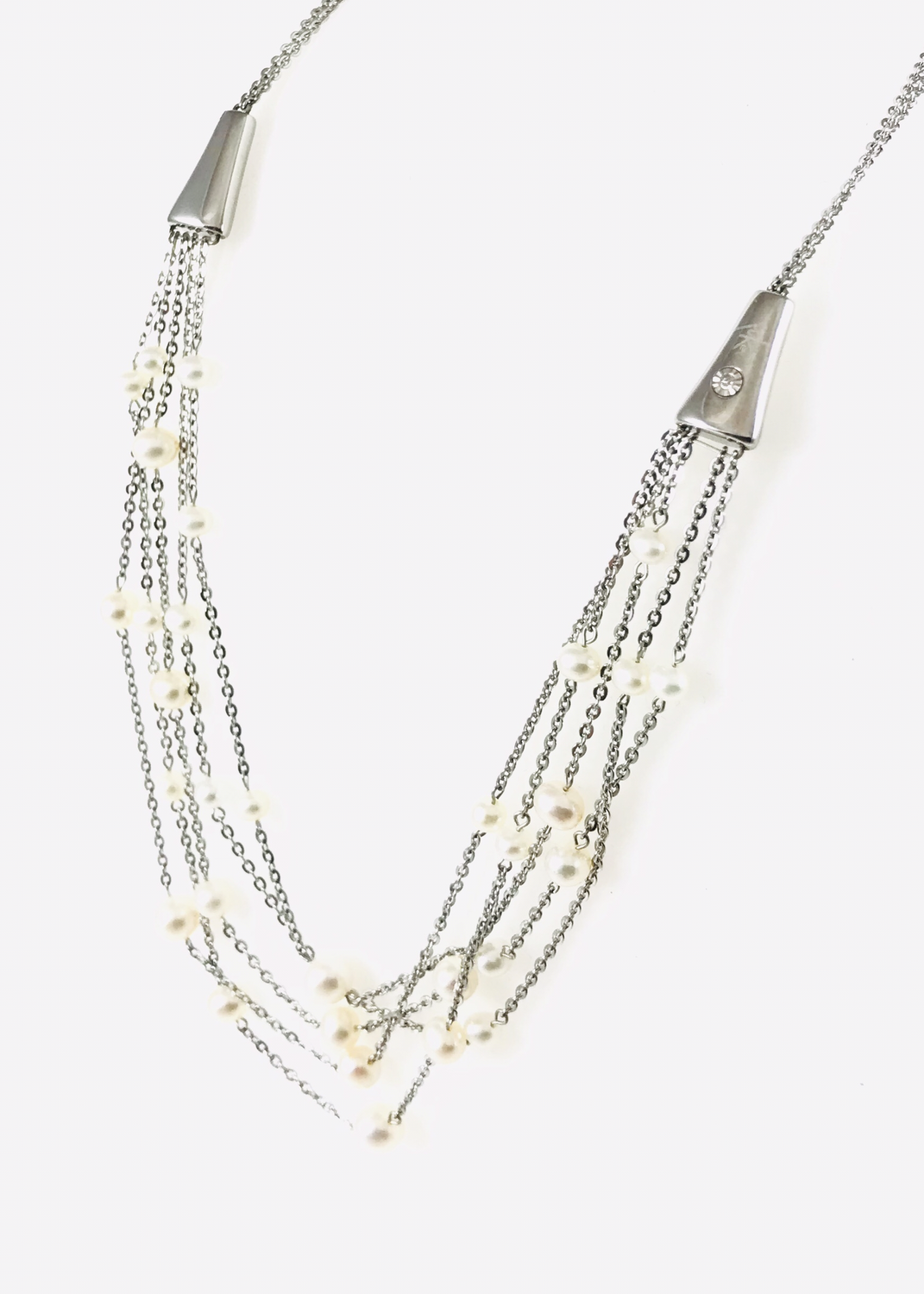 GIROCOLLO MULTIFILO IN ACCIAIO CON PERLE CASTONE IN ORO E DIAMANTE.