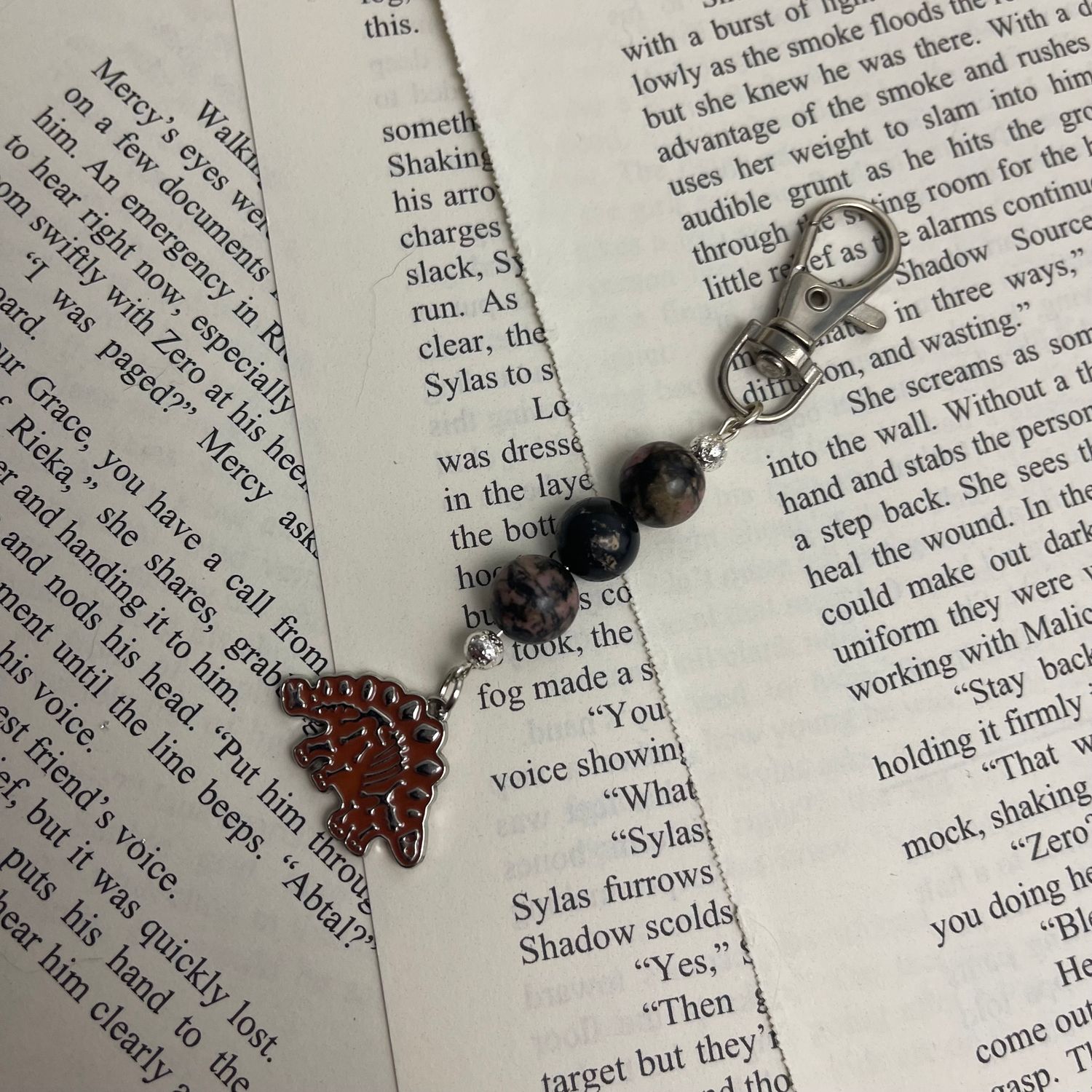 Dino Stegosaurus Skeleton with Rhodonite Beads Charm