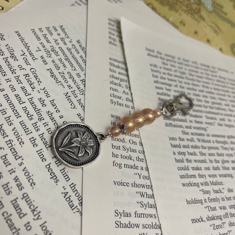 Silver Lily Coin Charm