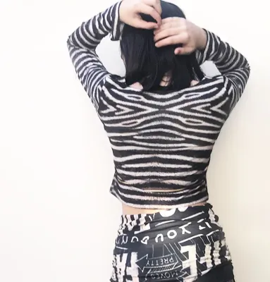 IPNG: Label Longings Zebra Crop Top