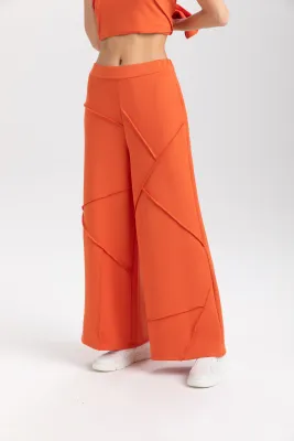 Isle Apparel By Wild Curves: Dara Pant In Papaya Side