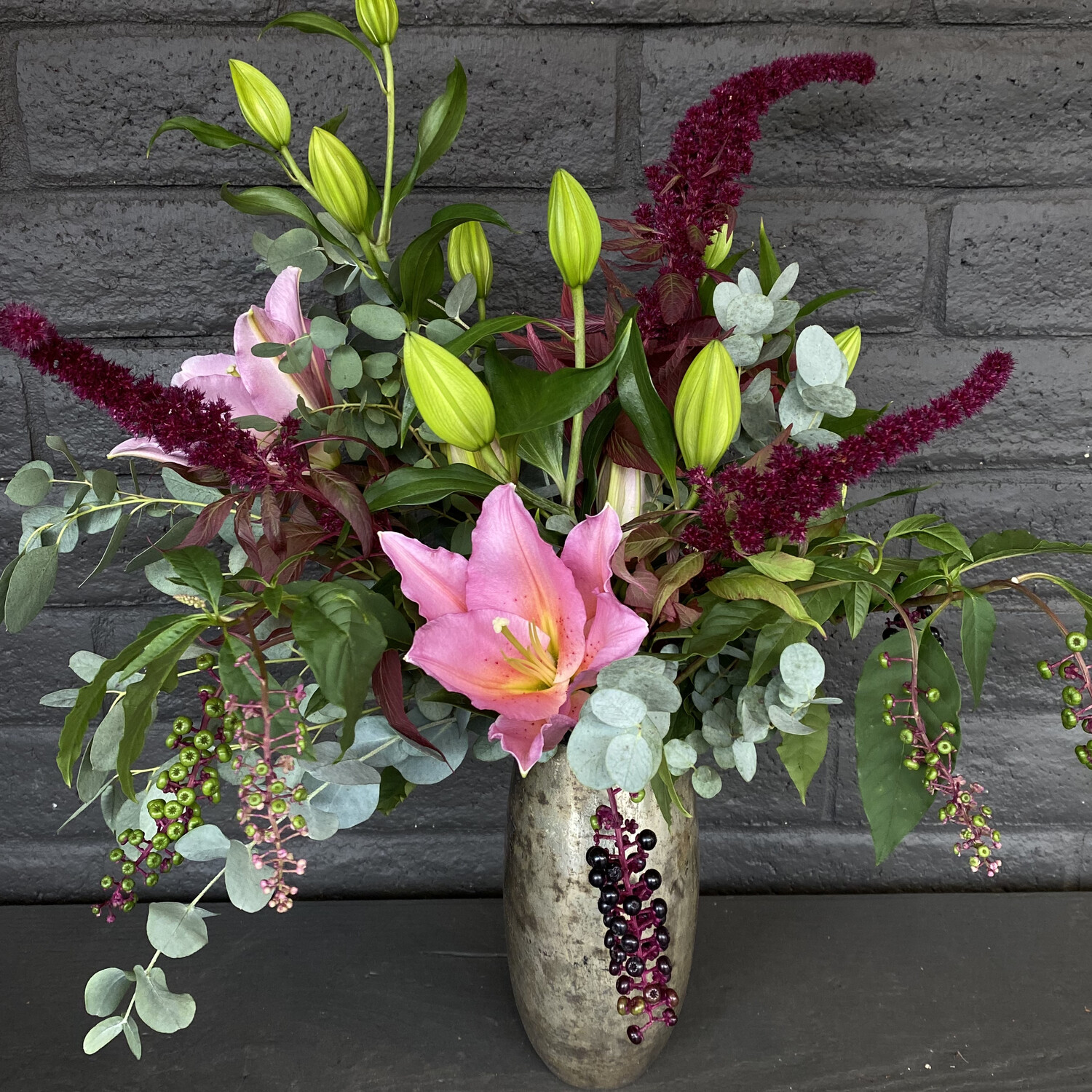 LOCAL PINK LILIES IN MERCURY METALLIC VASE LOCAL PINK LILIES IN MERCURY METALLIC VASE