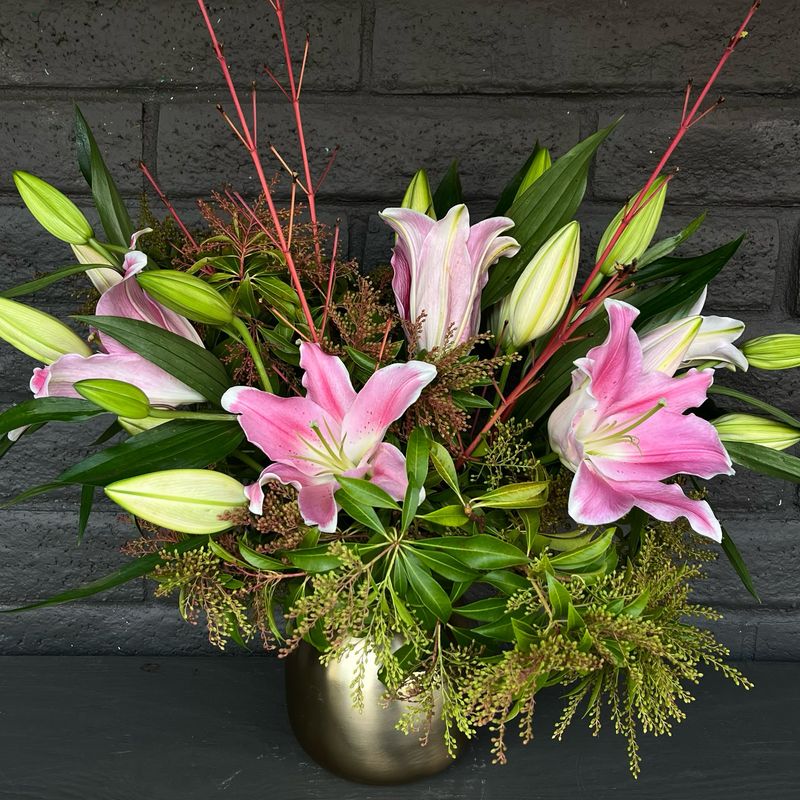 LILIES IN BRASS VASE