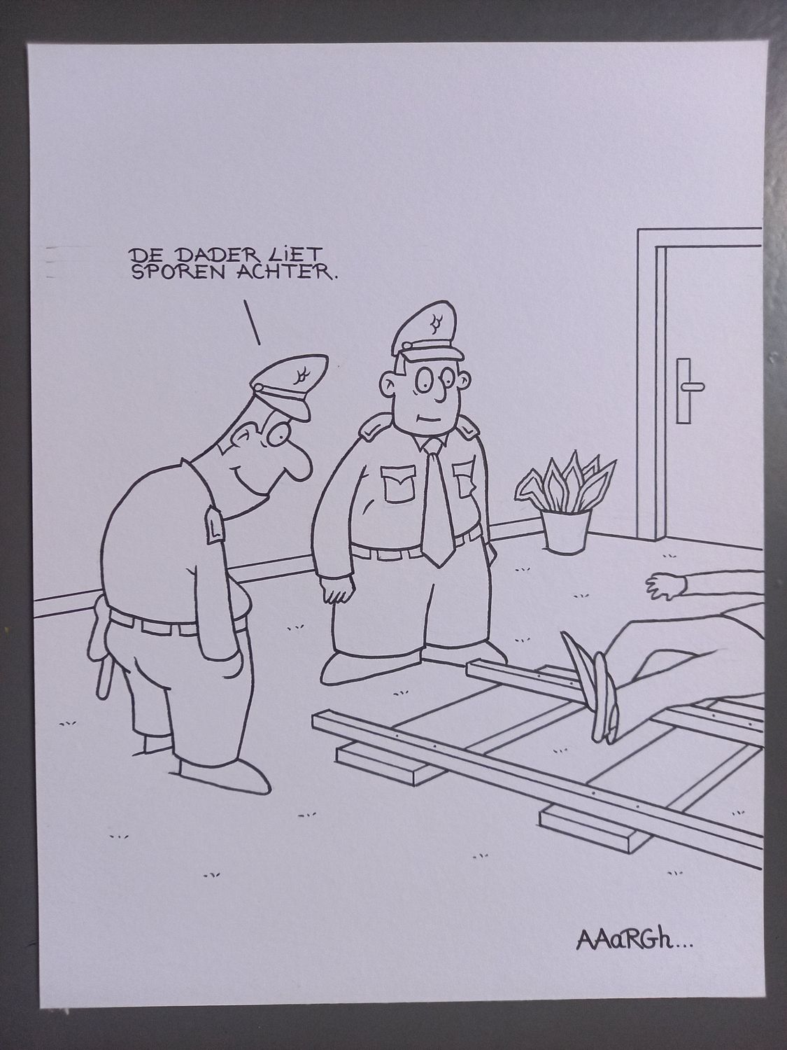 Originele cartoon: Sporen dader