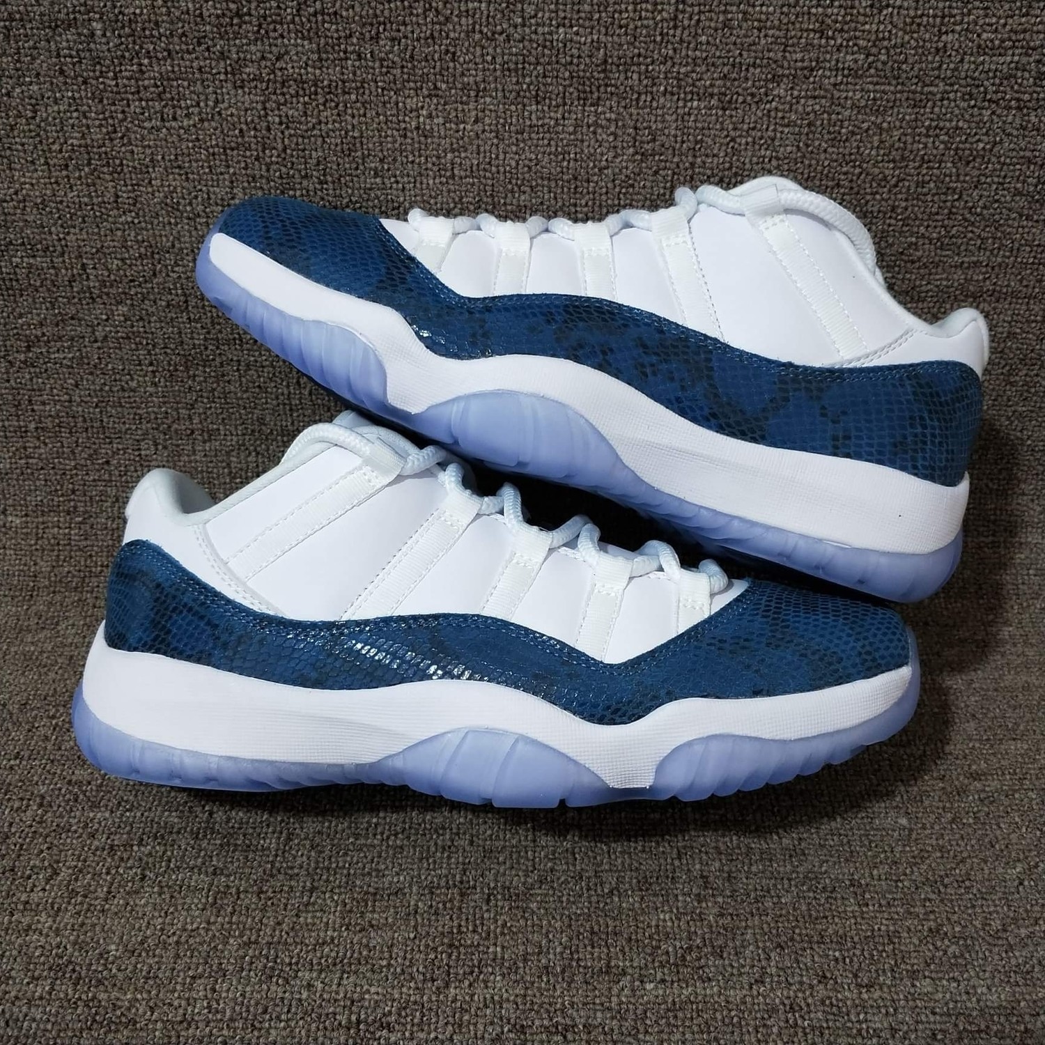 Air Jordan 11s Low Blue Snakeskin