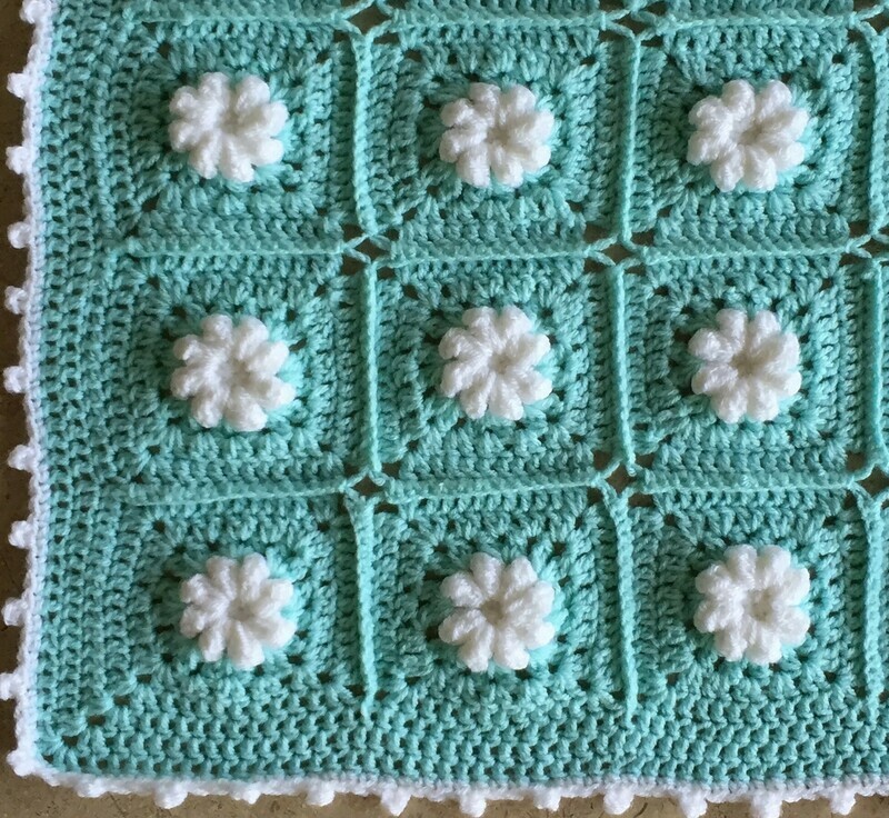 Baby Blanket: White flower in Turquoise square