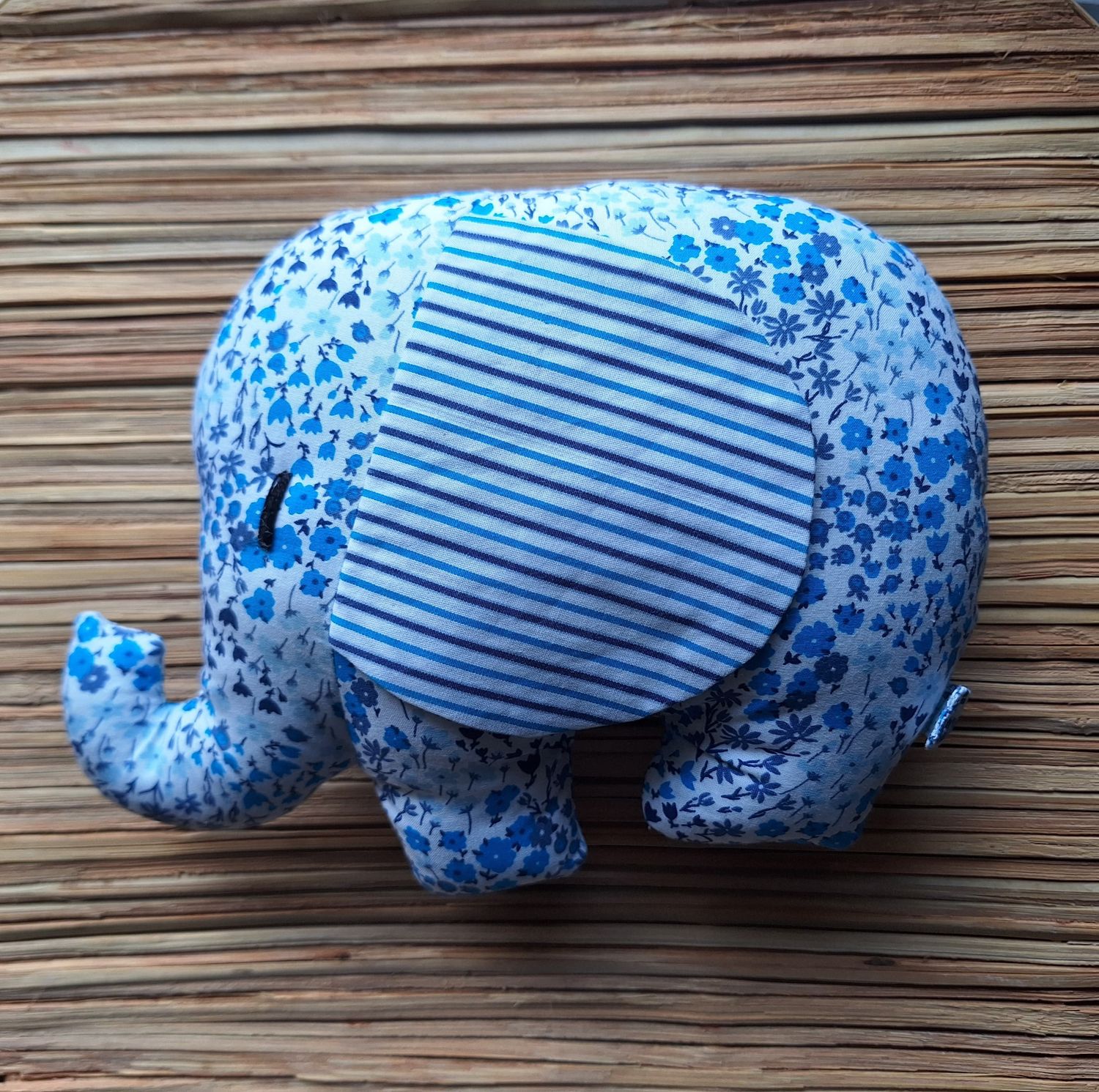 Mini Elephant:  round ear blue flower with white blue earing