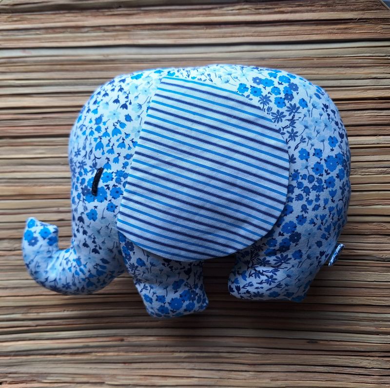 Mini Elephant:  round ear blue flower with white blue earing