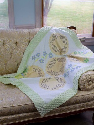 Quilted Blessings Blanket- peach flowers, Light Green Backing