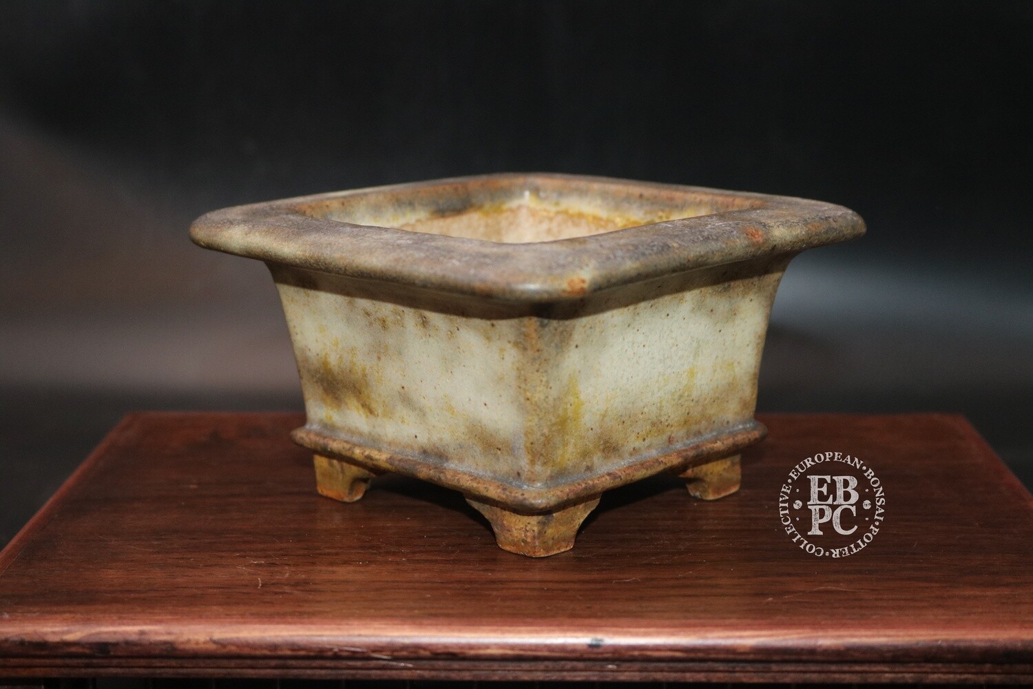 Ian Baillie - 13.8cm; Glazed; Square; Semi cascade; Stunning Antique cream glaze; Browns; Basal Band; Lip; Carved feet;