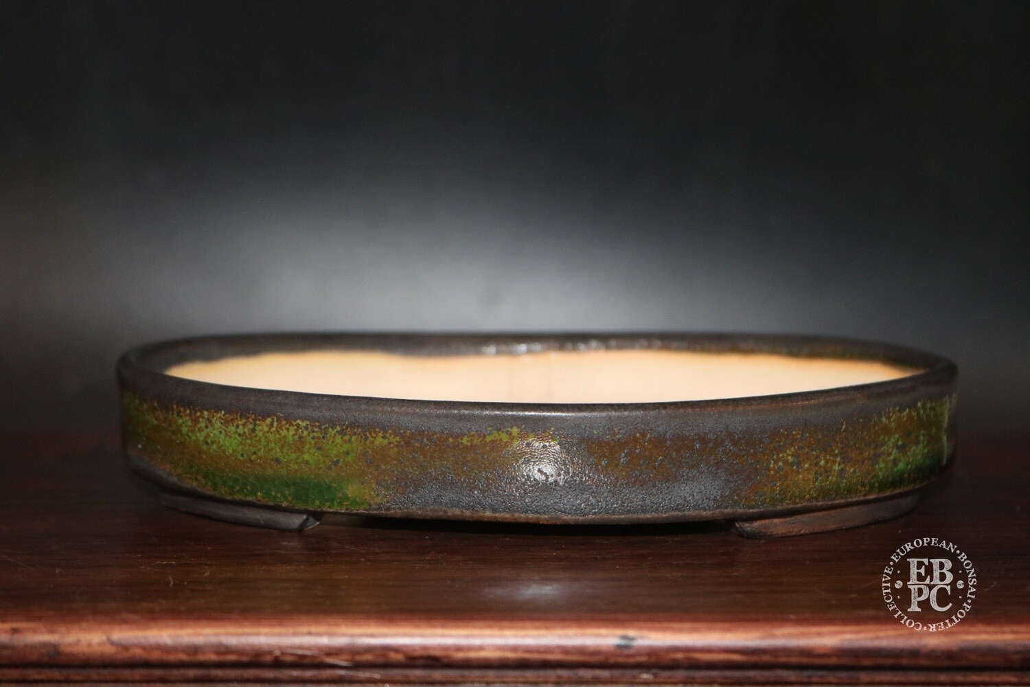 SOLD - Sabine Besnard - 17.7cm; Oval; Glazed, Translucent Green; Browns; Crackle Glaze