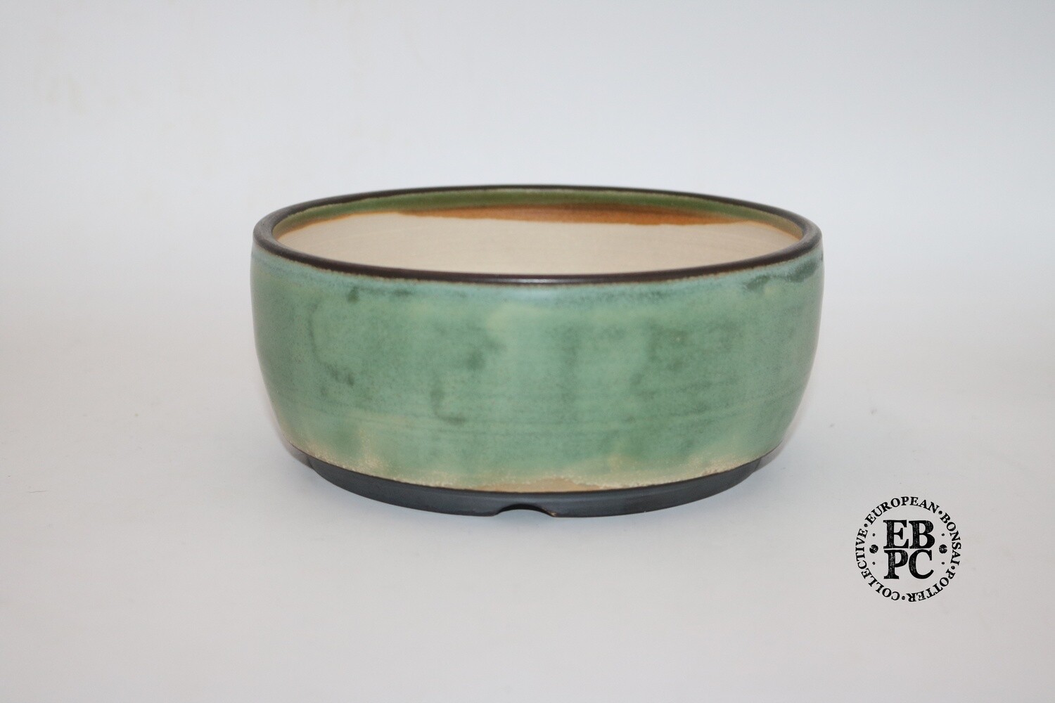 SOLD - Sabine Besnard - 18.3cm; White Clay; Round; Light Green; Semi-Translucent Glaze; Browns
