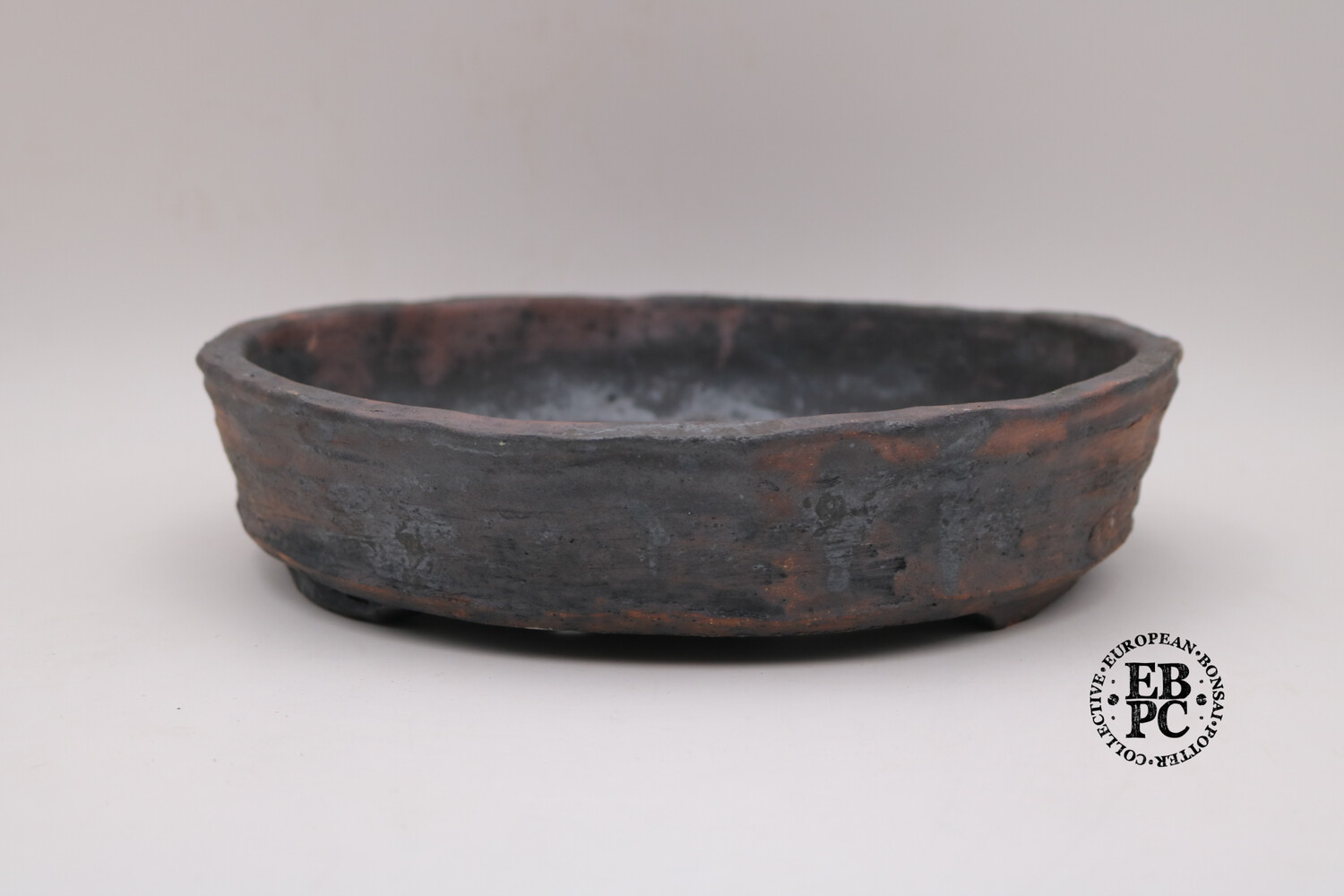 SOLD - Bryan Albright - 29.5cm; Round; Nanban; Unglazed; Oxide Wash; Browns, Reds; Greys