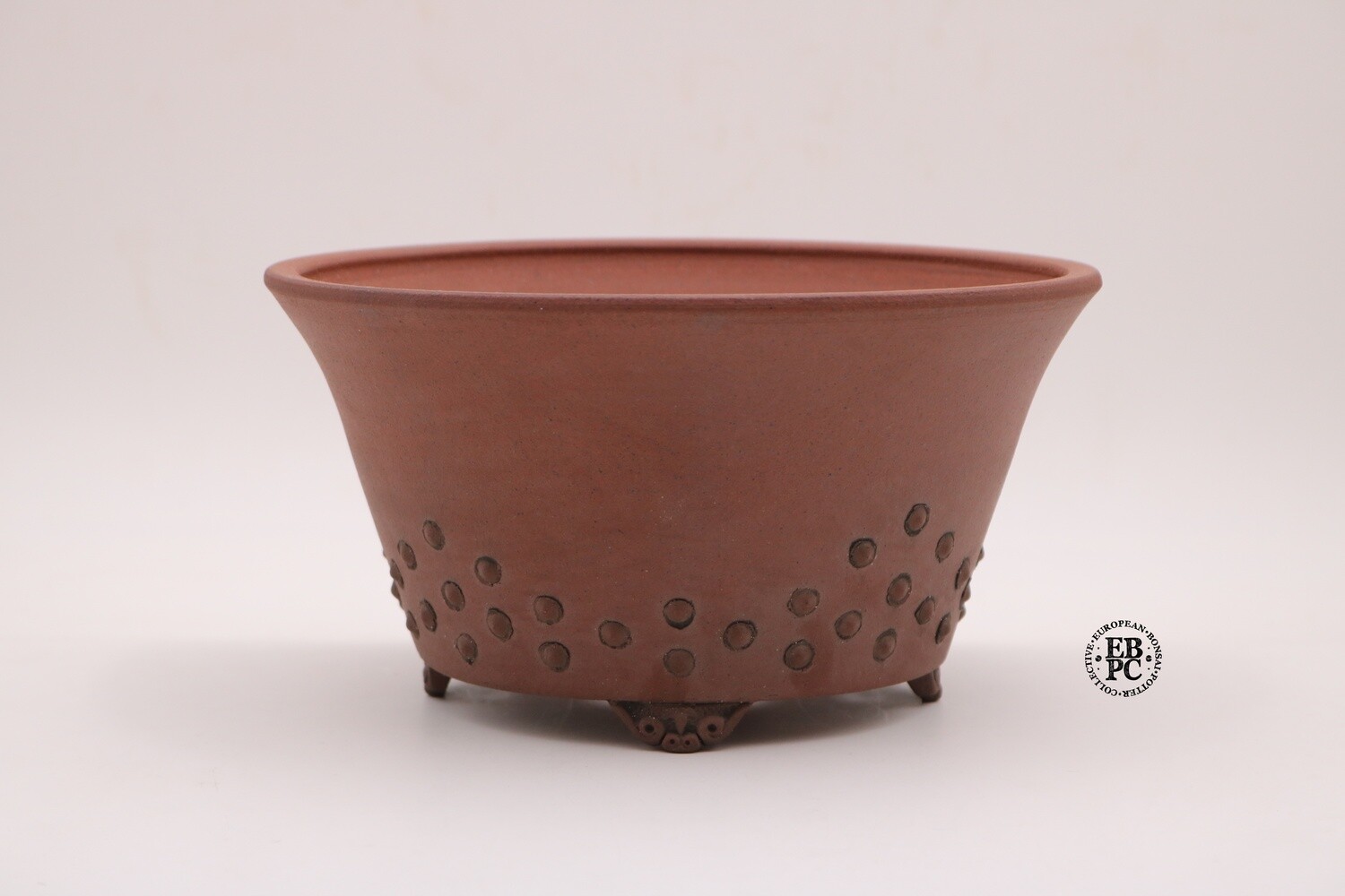 SOLD - Stone Monkey Ceramics - 23cm; Unglazed; Round; Studded pattern; Reddish clay (like shudei); EBPC Stamped; Andrew Pearson; Gafu-ten winner;