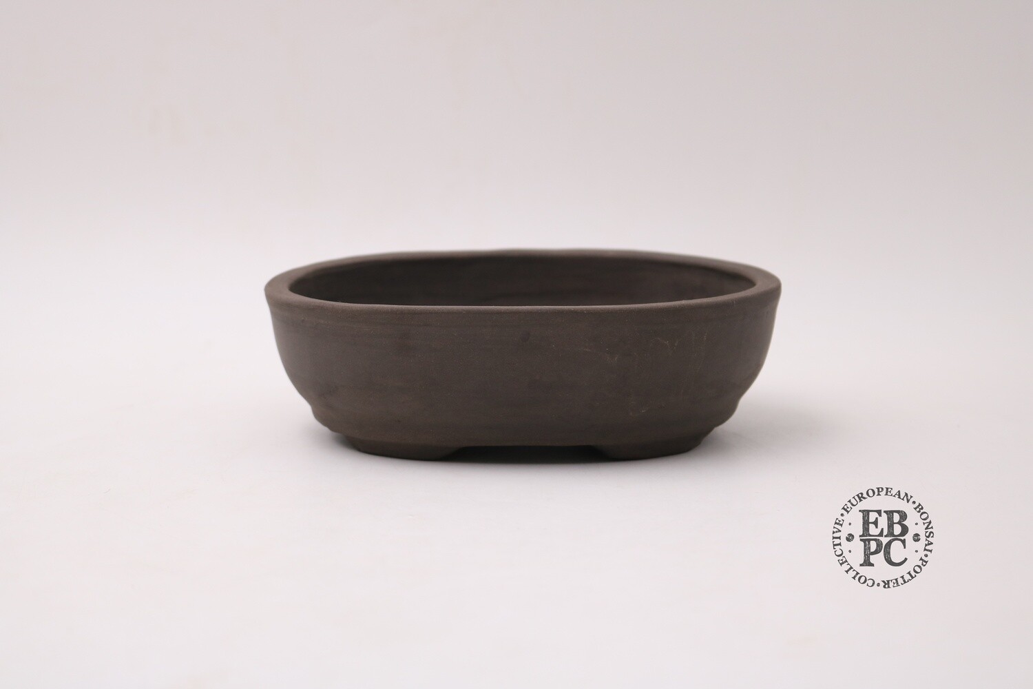 SOLD - Zey Ceramics - 17.5cm; Unglazed; Dark Brown Clay; Basal Band; Recessed feet;
