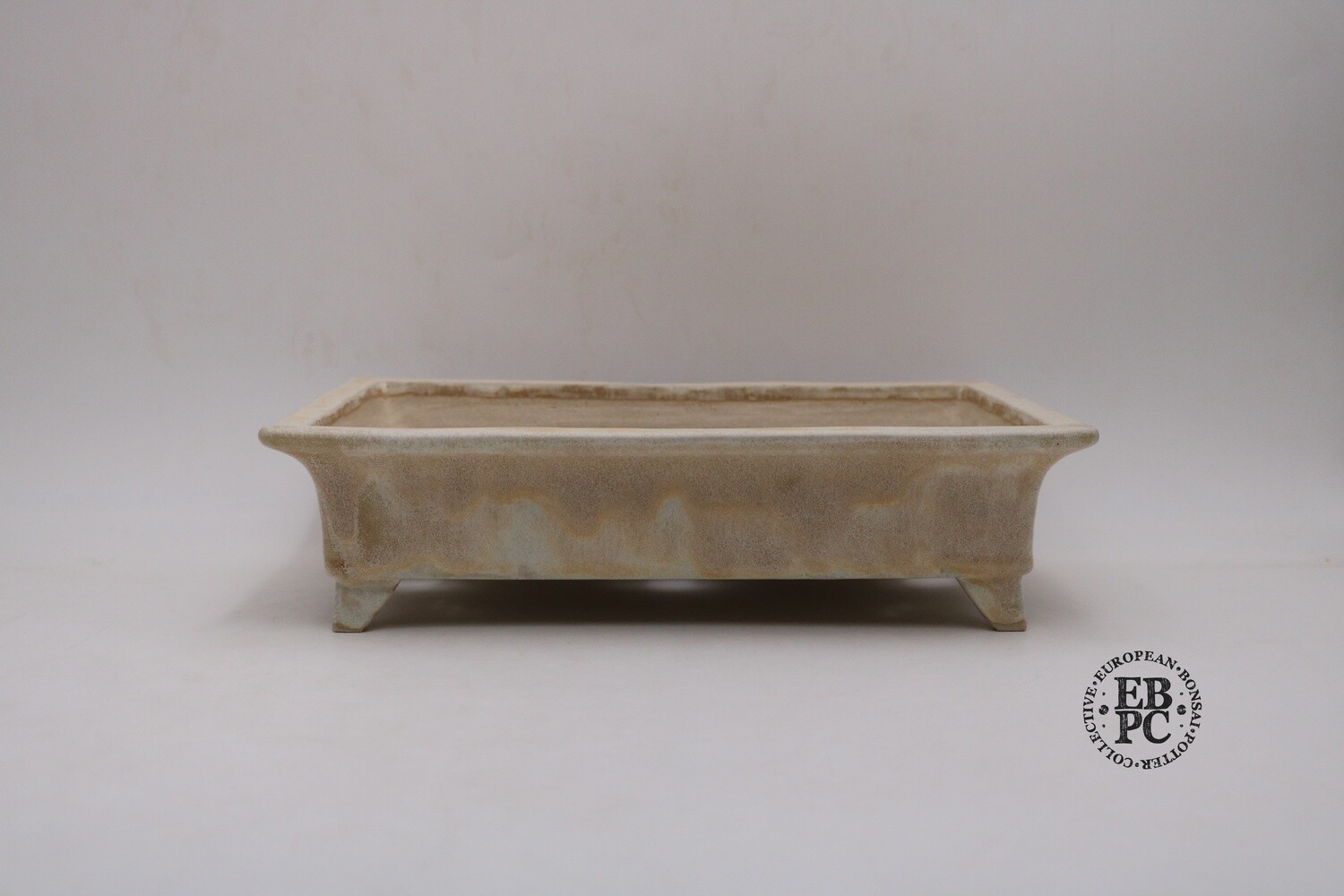Jürg Stäheli - Switzerland. 30.7cm; Glazed; Rectangle; Outward-cut feet; Lip to rim; Superb drippy glaze; Apricot