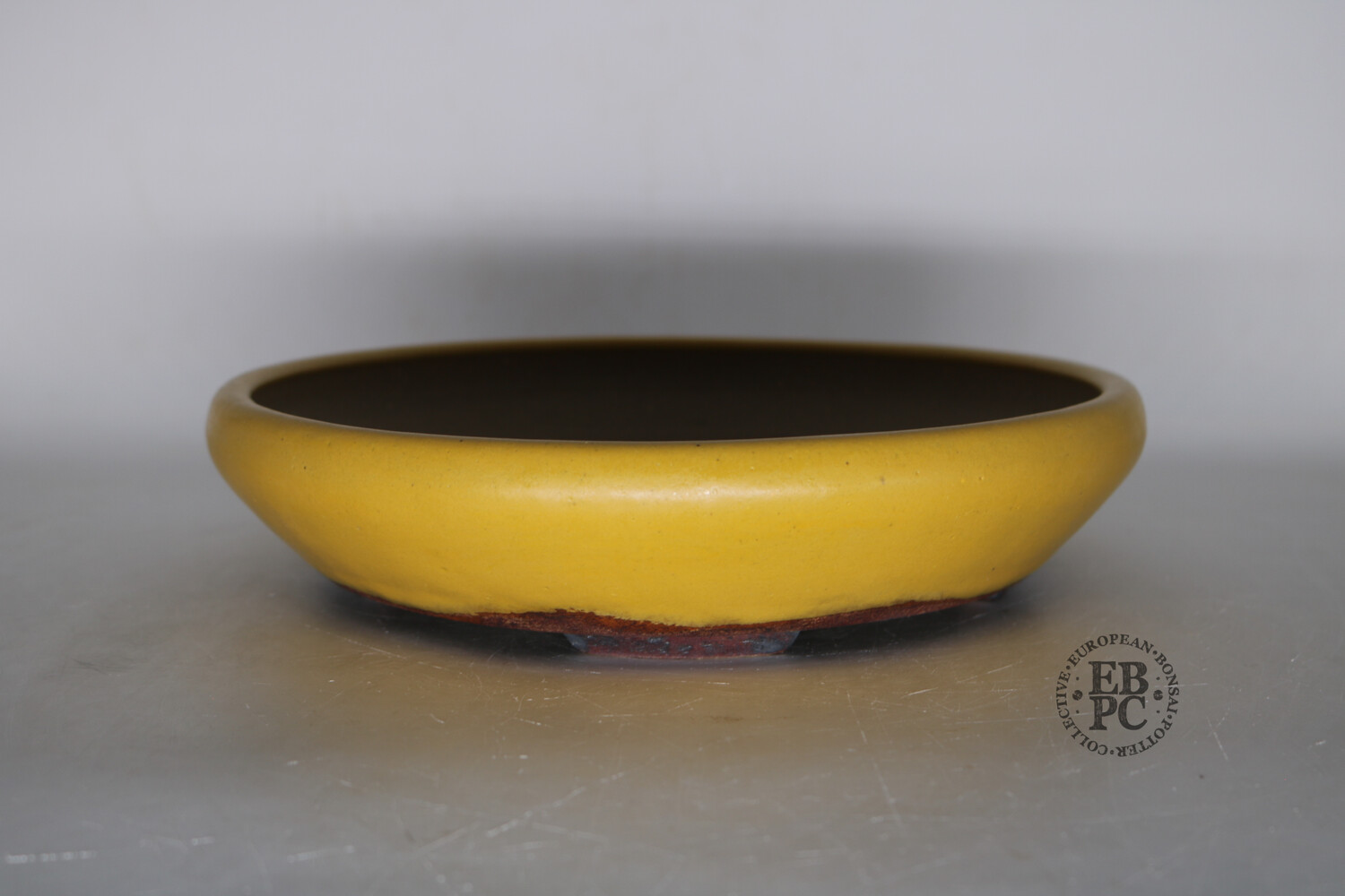 SOLD - Ian Baillie - 26.3cm; Round; Superb Yellow Glaze; Contrasting Darker Feet; Low Profile; Superb Piece!