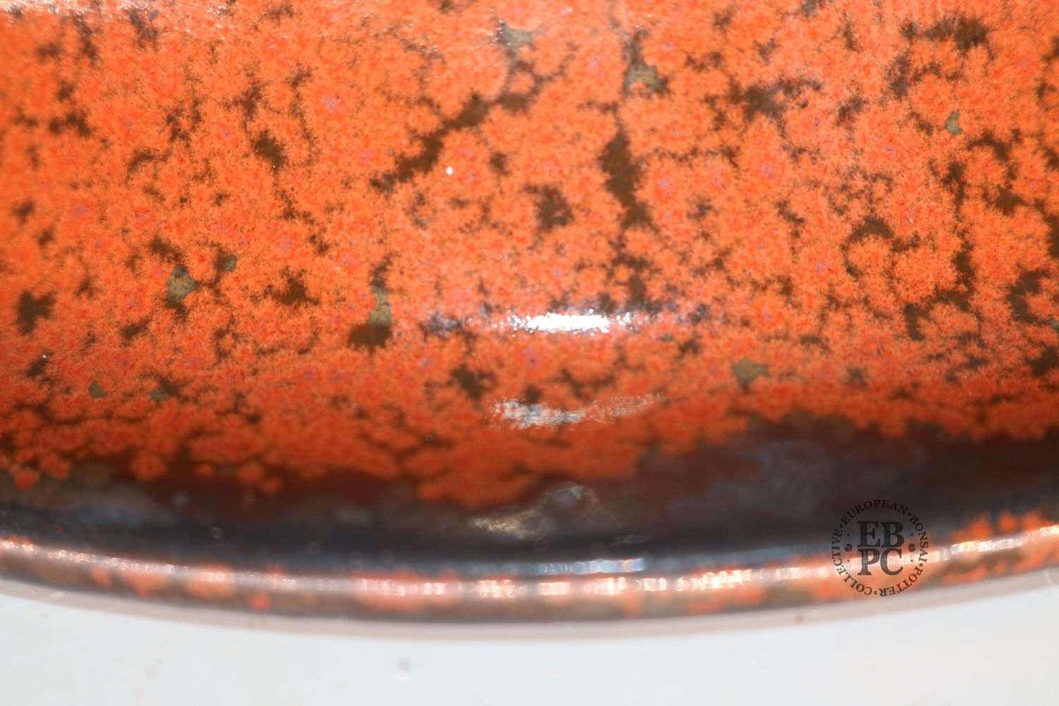 Ian Baillie - 19.2cm; Glazed; Round; Exaggerated Lip; Stunning Metallic Gunmetal &amp; Red Crystalline Glaze; Scroll Design Feet
