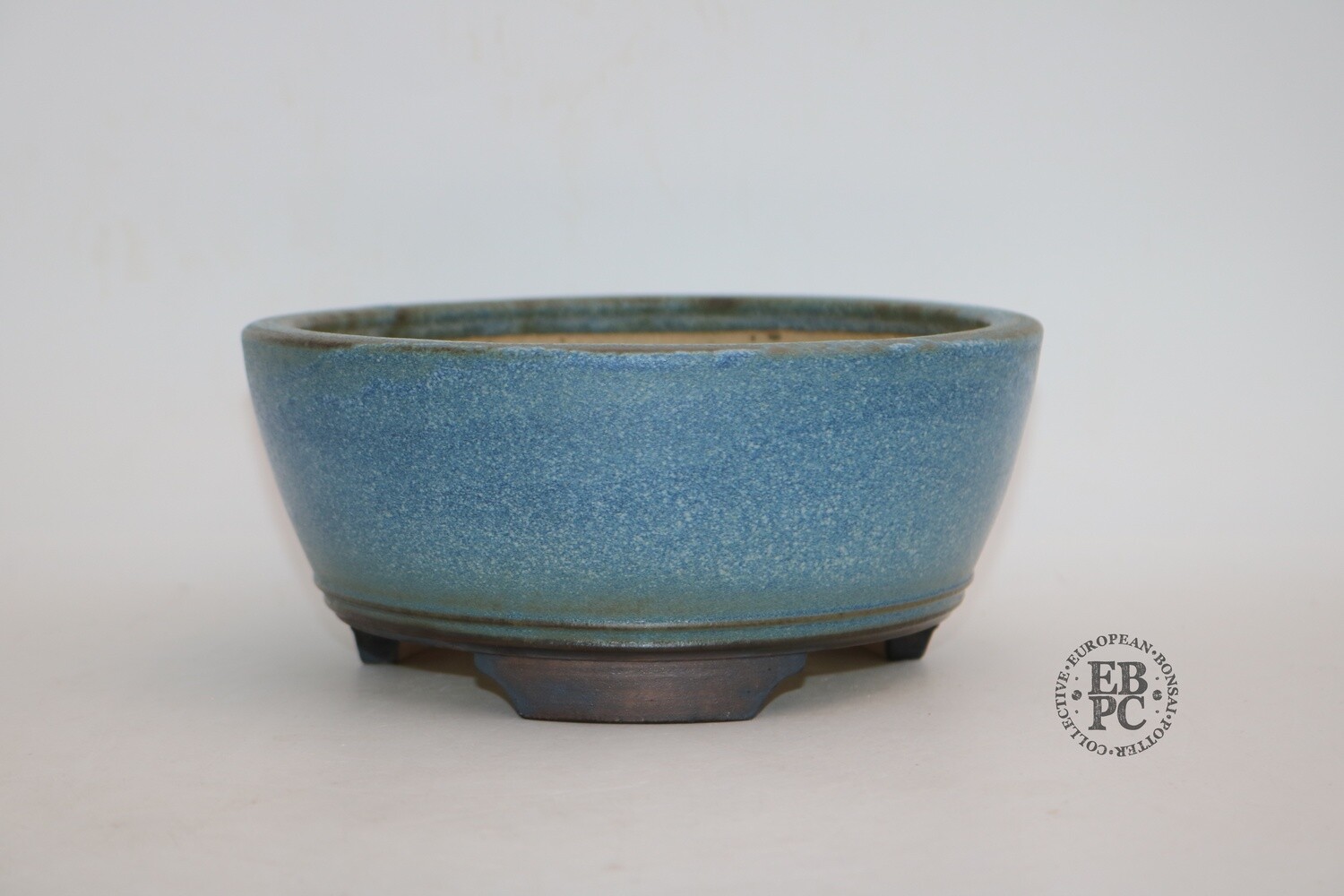 Ian Baillie - 18.8cm; Glazed; Round;  Double Basal Band in Relief; Speckled Blue; White; Brown