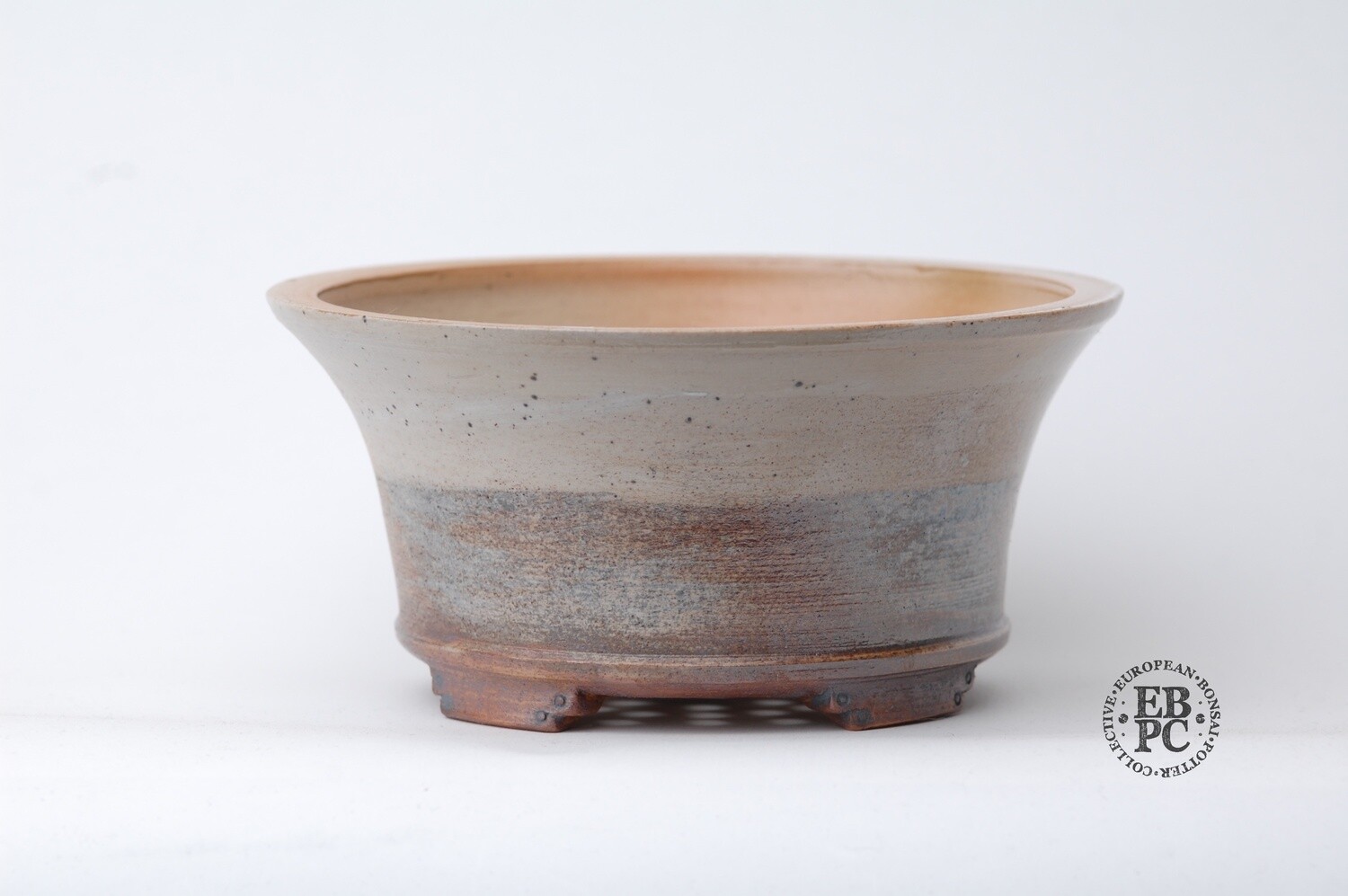 Englert Keramik - 19.8cm; Round; S/Cascade; Wood-fired; Porcelain &amp; Iron Slip / Salt Glazed; Medium Iron Clay Body; Ornate Feet Detail; Browns; Varied Tones; Martin Englert