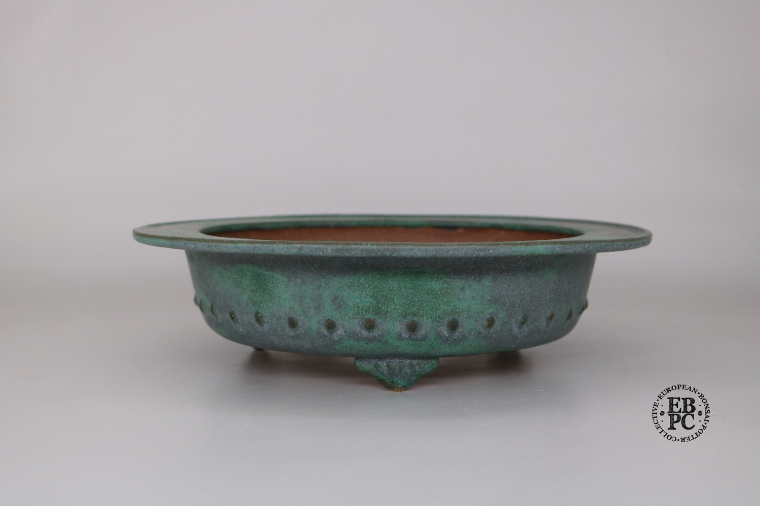 Fukurou Ceramics - Switzerland. 27cm; Hand-made; Round; Superb Glaze; Exaggerated Lip Design; Formal Row of Studs; Cloud Feet; Greens; Grey; Patrik Lüthi