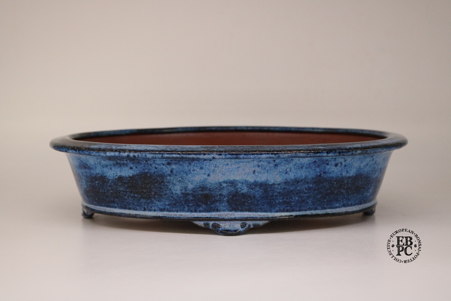Fukurou Ceramics - Switzerland. Hand-made; 31.2cm; Oval; Lip to Rim; Basal Band in Relief; Cloud Feet; Glazed; Namako-like Blue; Patrik Lüthi