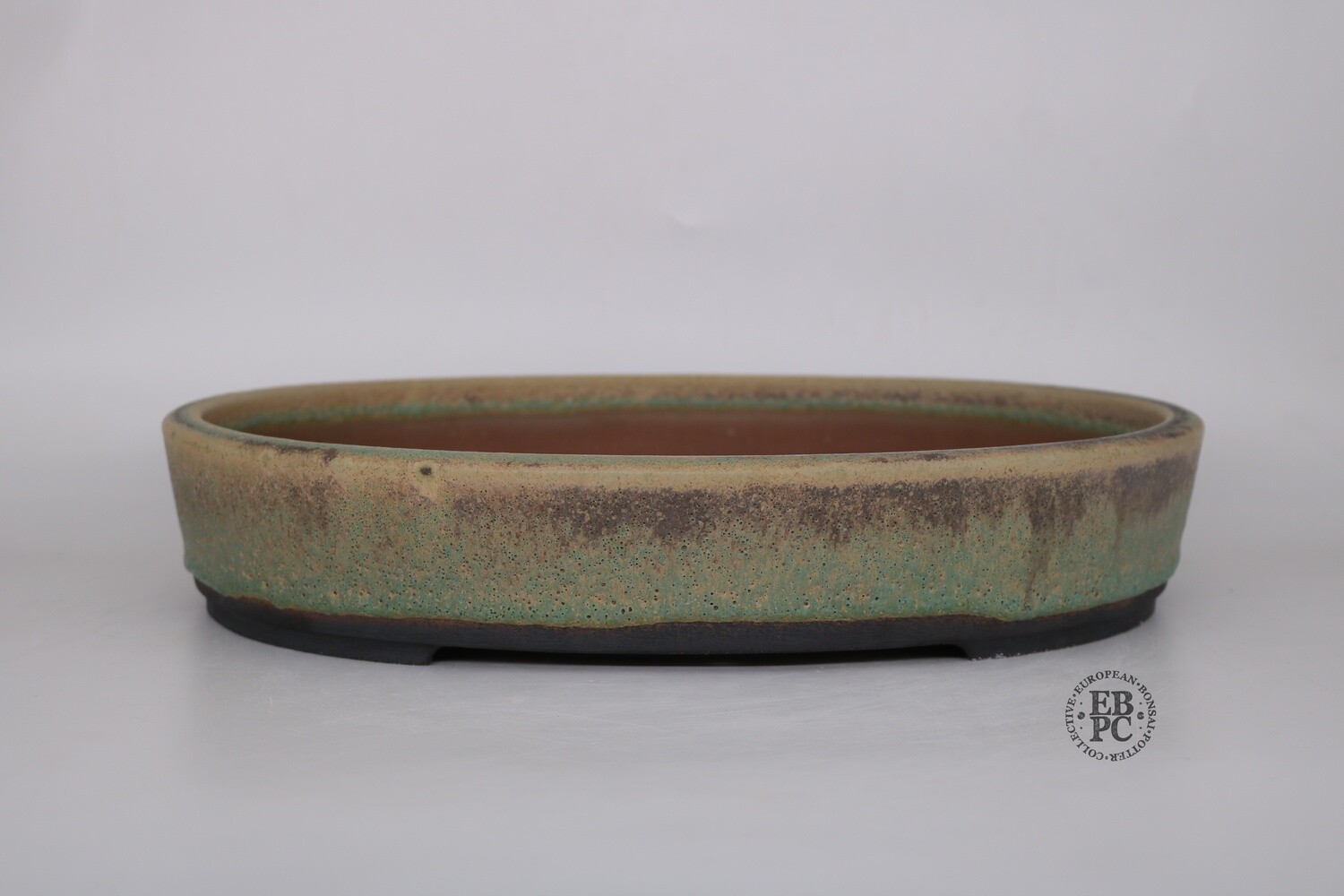 Walsall Studio Ceramics - Esther Griffiths.  38cm; Glazed; Oval; Deeper Profile; Incredible glaze; Recessed Feet; Cream; Browns; Greens.