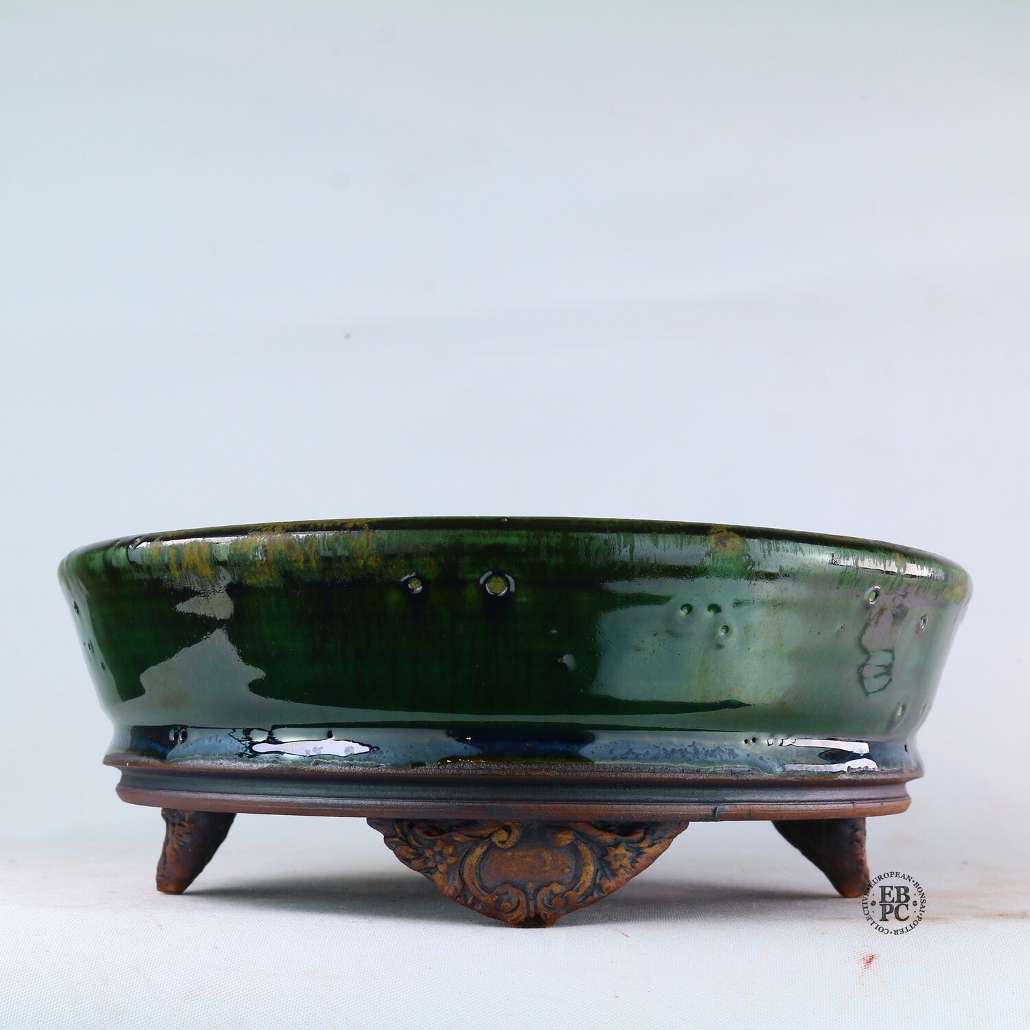 Kingdom Bonsai Pots - Ireland. 21.6cm; Formal Round; Carved Feet; Superb Glaze; Translucent Dark Green; EBPC Stamped; Enda Coyne