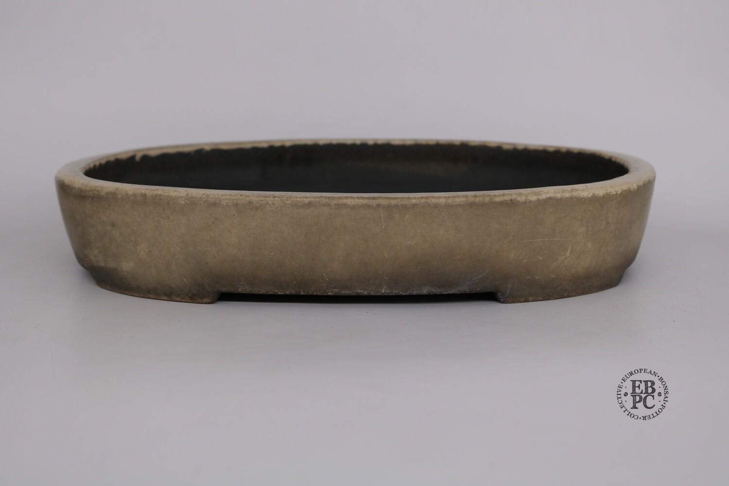 Aiba Koyo - Tokoname, Japan.  35cm; Vintage Oval; Glazed; Older Pre-Loved Pot; Black Clay; Excellent Cream Crackle Glaze; Loads Of Patina!
