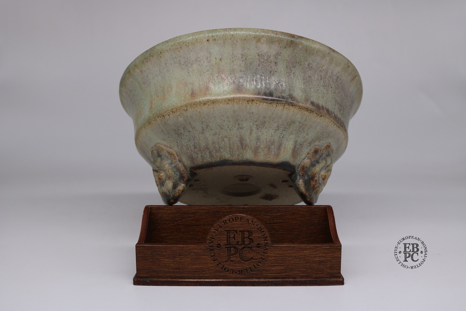 Ian Baillie - 18.3cm; Round; Antique Cream Glaze; Floral Design Feet; Triple Stamped: EBPC, IB, Scotland.