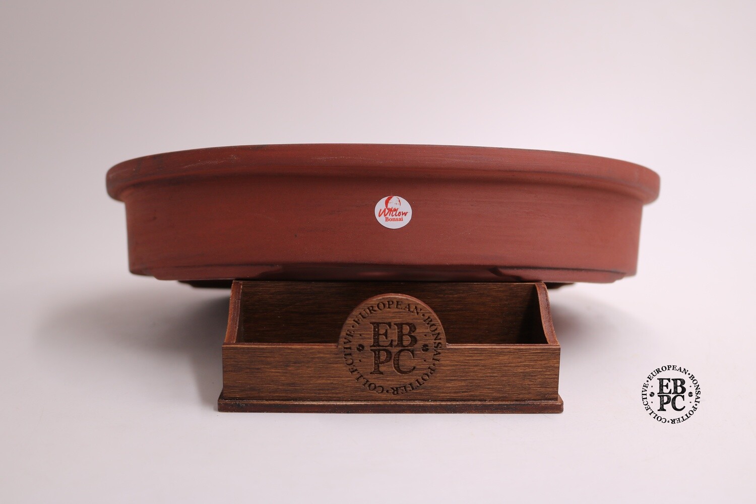 Willow Bonsai Pots. 24.8cm; Oval; Unglazed; Iron Red Finish; Recessed Feet; Lip to Rim; Made in South Africa.