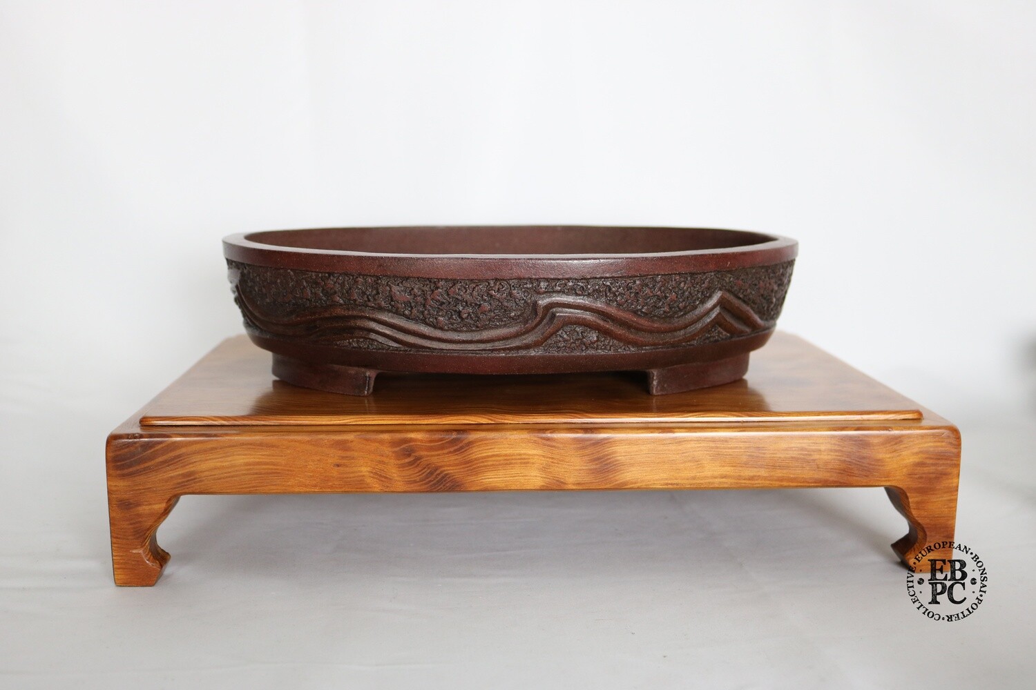 M. J. G. Ceramica - Unglazed; Oval; 29.5cm; Carved Wave Design in Relief;  Textured Bod; Reddish-brown Clay; Maria Jose Gonzalez