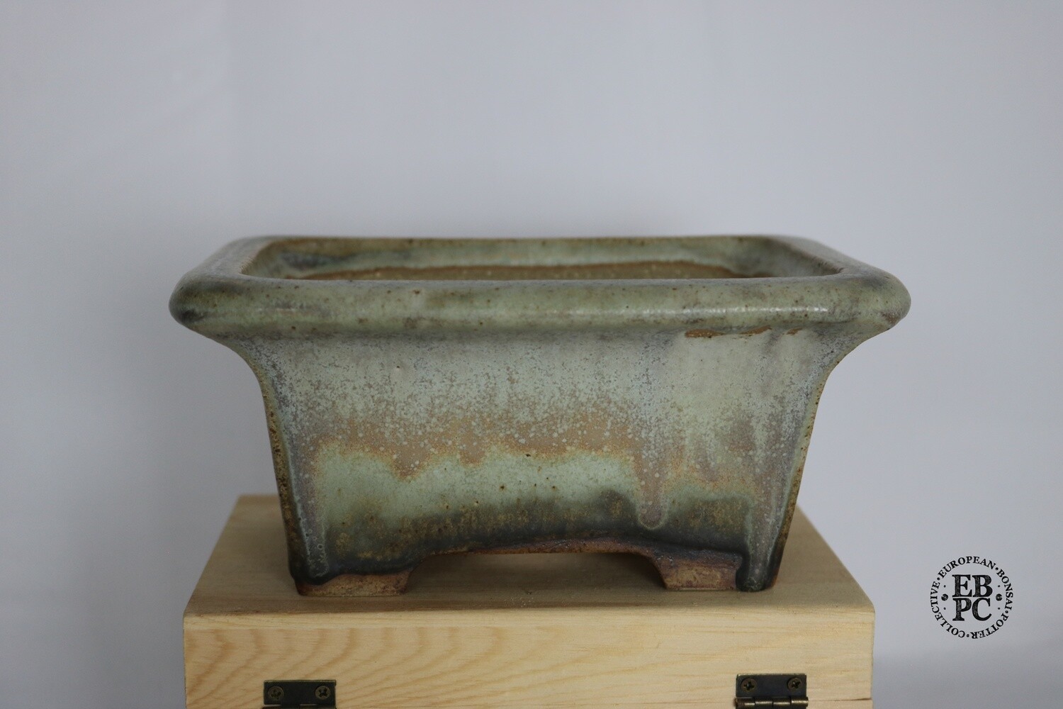Ian Baillie - 18.6cm; Glazed; Rectangle; Deep profile; Stunning Running Glaze; Light Greens; Browns; Extended Lip Design; Integrated Feet; &#39;IB&#39;, &#39;Scotland&#39; &amp; &#39;EBPC&#39; Stamped