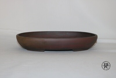 Willow Bonsai Pots.  24.8cm; Unglazed Oval; Manganese Oxide Wash; Recessed Feet; Reddish Browns; Made in South Africa.
