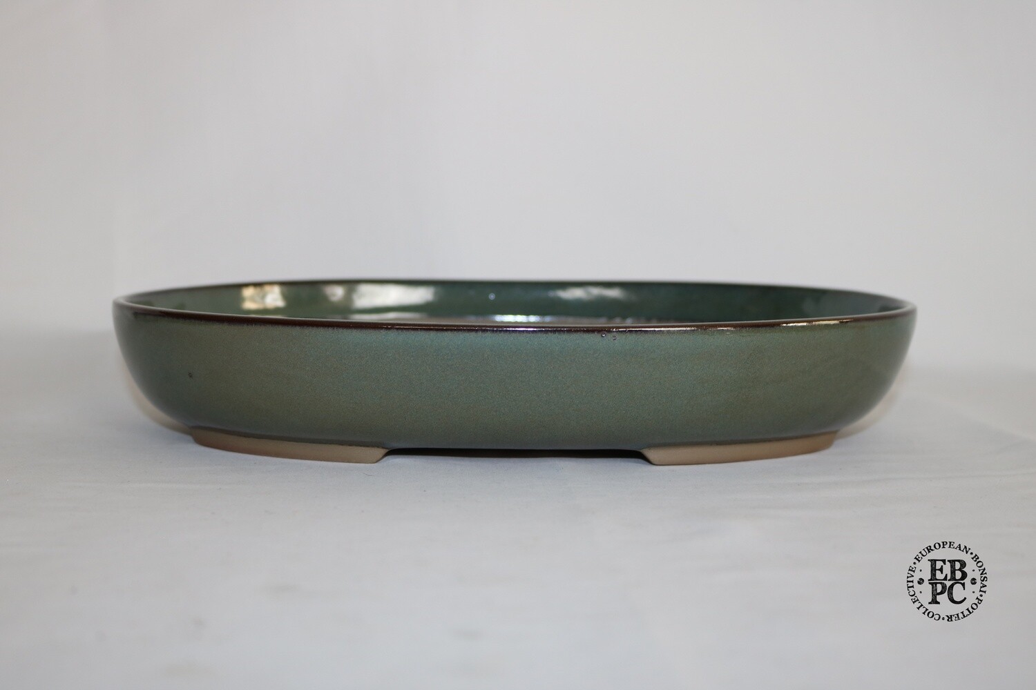 Willow Bonsai Pots. 31cm; Oval; Starry Night Glaze; Dark Green; Recessed Feet; Lip to Rim; Made in South Africa.