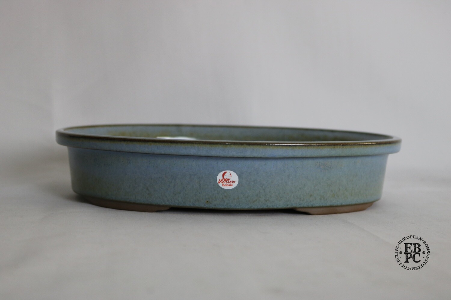 Willow Bonsai Pots. 25cm; Oval; Sky Blue Glaze; Recessed Feet; Lip to Rim; Made in South Africa.