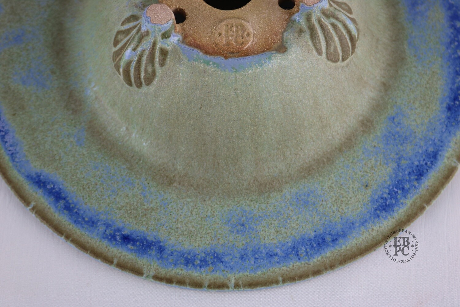 Fukurou Ceramics - Switzerland.  26.1cm; Hand-made; Refined Round; Wide-Lipped Design; Sculpted Feet; Exquisite Glaze; Greens; Browns; Vibrant Blue; Patrik Lüthi; EBPC Stamped.