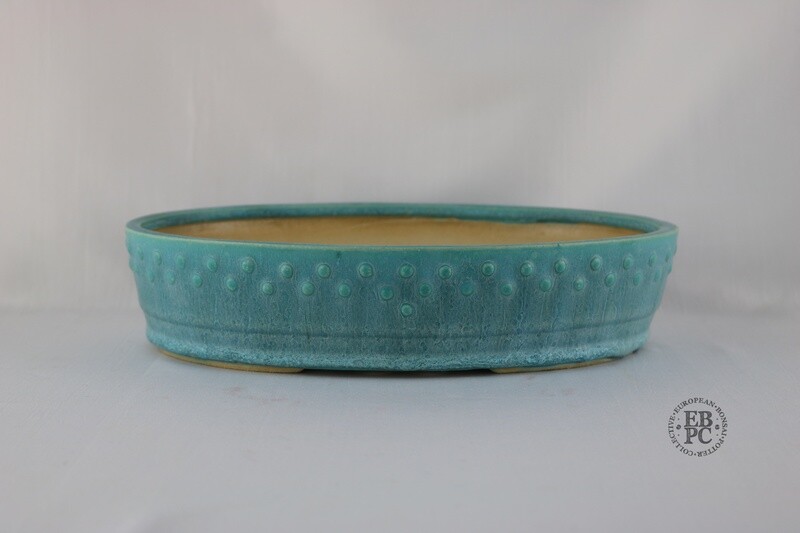 Fukurou Ceramics - Switzerland.  26.8cm; Hand-made; Oval; Elegant Design; Studded Pattern; Basal Band; Superb Turquoise Glaze; White and Blue / Green; Patrik Lüthi